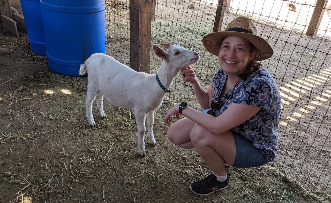 Heidi petting goats at Carmel Valley Ranch